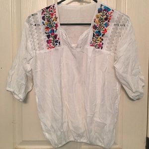 White and embroidered flower blouse